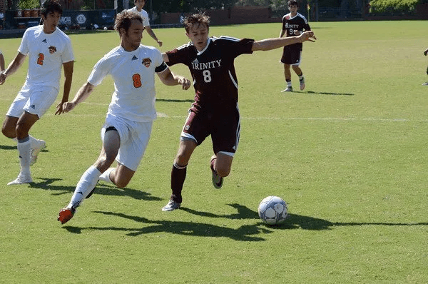 Ian Evans along playing university soccer